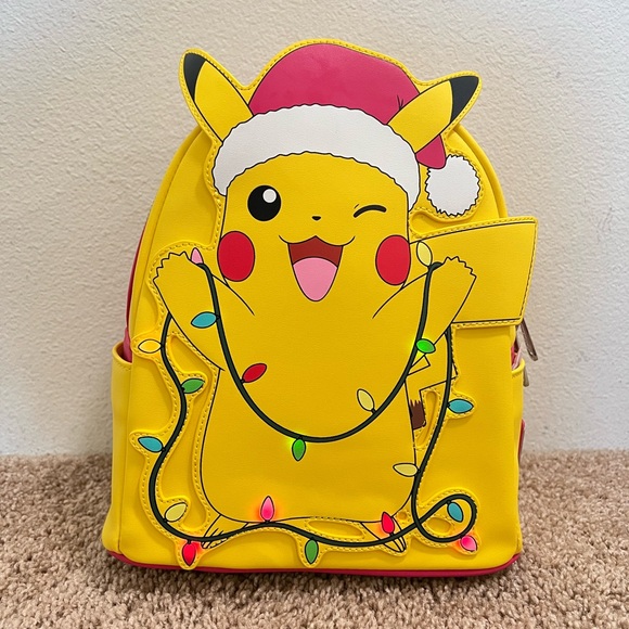 Loungefly Handbags - NWT Loungefly Pokémon Pikachu light up Christmas lights backpack